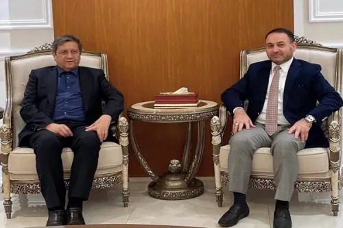 همتی در بغداد موانع مبادلات تجاری و بانکی ایران و عراق برطرف می شود؟